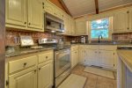 Kitchen with granite counter tops and stainless electric applainces